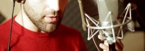 A voice artist during a recording session.